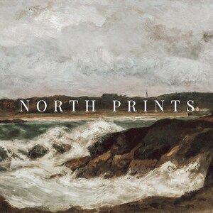 May include: A painting of a stormy seascape with crashing waves and a rocky coastline. The sky is overcast and gray, with a hint of blue in the distance. The painting is titled "NORTH PRINTS".