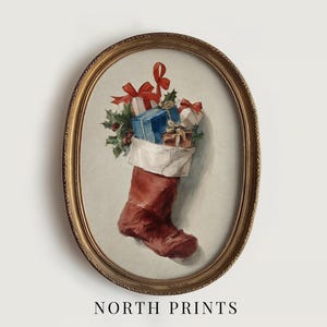 May include: Oval framed print of a Christmas stocking filled with gifts and holly. The stocking is red with a white cuff, overflowing with wrapped presents and topped with red bows. The frame is gold, and the print has a vintage aesthetic.