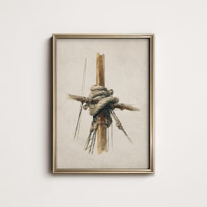 May include: Framed watercolour print of a nautical knot. The artwork shows a detailed depiction of a rope knot tied around a wooden post, with intricate rope details and a neutral colour palette. The frame is gold.