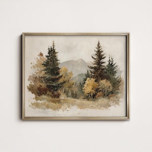 May include: A framed landscape painting depicting a forest scene with tall evergreen trees, yellowing deciduous trees, and a mountain range. The artwork has a muted colour palette and a gold-coloured frame.