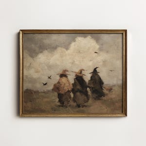 Puede incluir: Una pintura al óleo enmarcada que representa a tres figuras con sombreros puntiagudos y capas largas caminando por un campo bajo un cielo nublado y cubierto. Varias aves pequeñas son visibles en el aire contra los tonos tierra apagados.