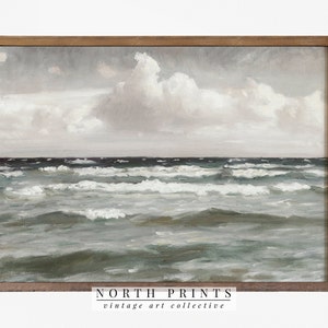 May include: A framed painting of a seascape with a cloudy sky and choppy waves. The painting is in a brown wooden frame. The text "NORTH PRINTS vintage art collective" is at the bottom of the image.