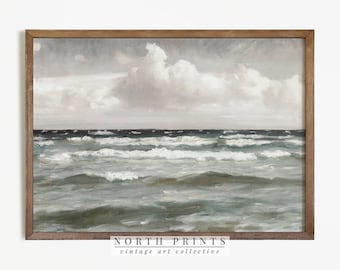 May include: A framed painting of a seascape with a cloudy sky and choppy waves. The painting is in a brown wooden frame. The text "NORTH PRINTS vintage art collective" is at the bottom of the image.