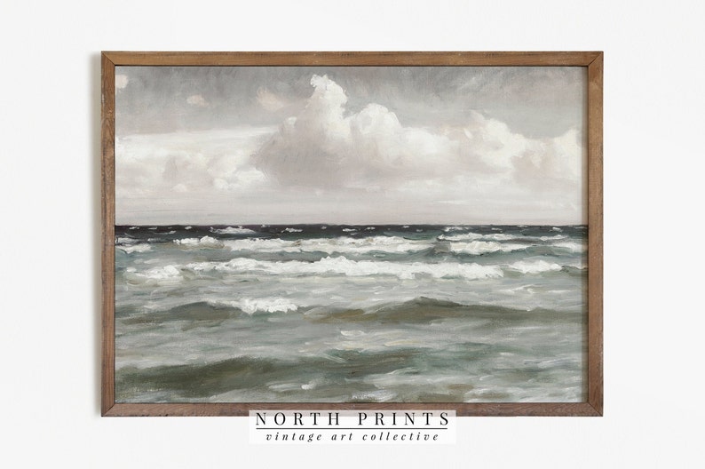 May include: A framed painting of a seascape with a cloudy sky and choppy waves. The painting is in a brown wooden frame. The text "NORTH PRINTS vintage art collective" is at the bottom of the image.