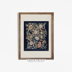 May include: A framed print of a vintage floral design. The print features a dark blue background with white and yellow flowers. The frame is a simple brown wood.