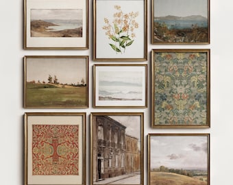 May include: A gallery wall set of nine framed art prints in gold frames, featuring landscapes, botanical illustrations, and intricate floral patterns. The collection includes various scenes of hills, water, and architecture, with the text NORTH PRINTS.