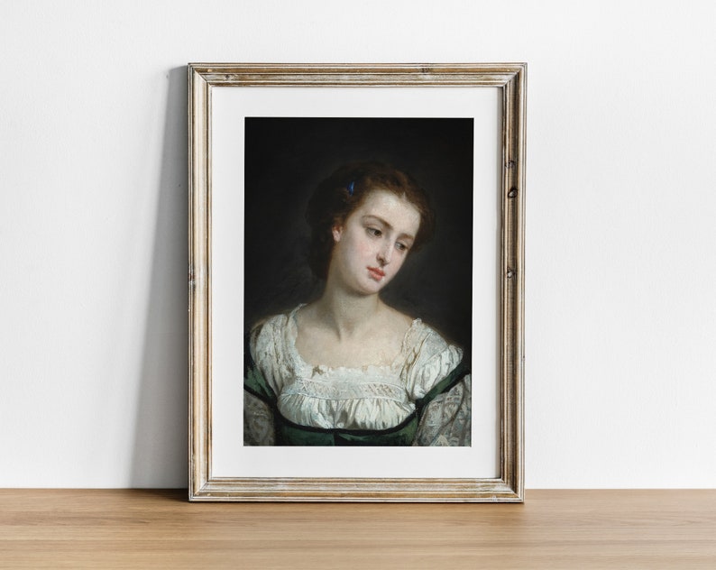 May include: A framed portrait painting of a woman with a light green dress and white lace collar. She has brown hair and is looking down with a thoughtful expression.