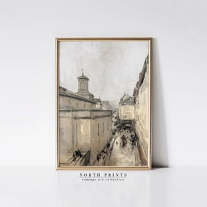 May include: A vintage print depicting a Parisian street scene with a church in the background. The print is in shades of grey and brown, with a hint of blue in the sky. The street is lined with buildings, and there are people and carriages in the street.