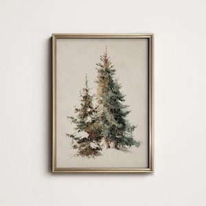 May include: A framed watercolor print featuring two evergreen trees in a snowy landscape. The trees are rendered in shades of green and brown, with a light dusting of snow. The frame is gold-colored.