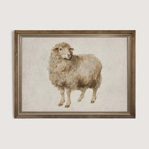 May include: Watercolor painting of a sheep in a wooden frame. The sheep is depicted in shades of beige and brown, with a fluffy coat and a serene expression. The artwork is framed with a brown wooden frame, adding a rustic touch to the piece.