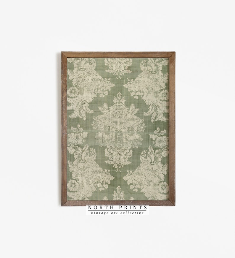 May include: A framed print of a vintage green and white damask pattern. The print is in a wooden frame with a light brown finish. The text "NORTH PRINTS vintage art collective" is at the bottom of the print.