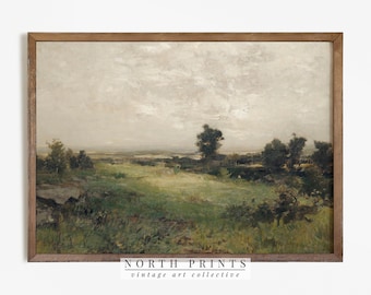 May include: A vintage landscape painting in a brown frame depicts a field with green grass, trees, and a cloudy sky. The painting has a muted color palette with shades of green, brown, and gray.