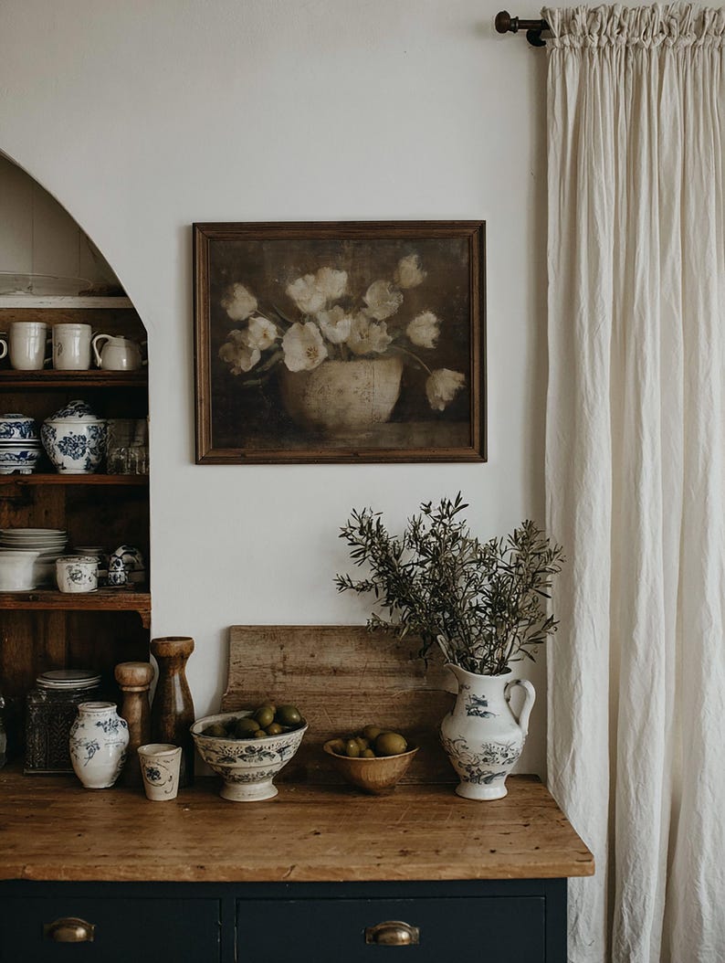 May include: A set of three ceramic mugs with a speckled, matte finish. The mugs are in shades of cream, light gray, and dark gray. Each mug has a simple, minimalist design and a rounded handle.