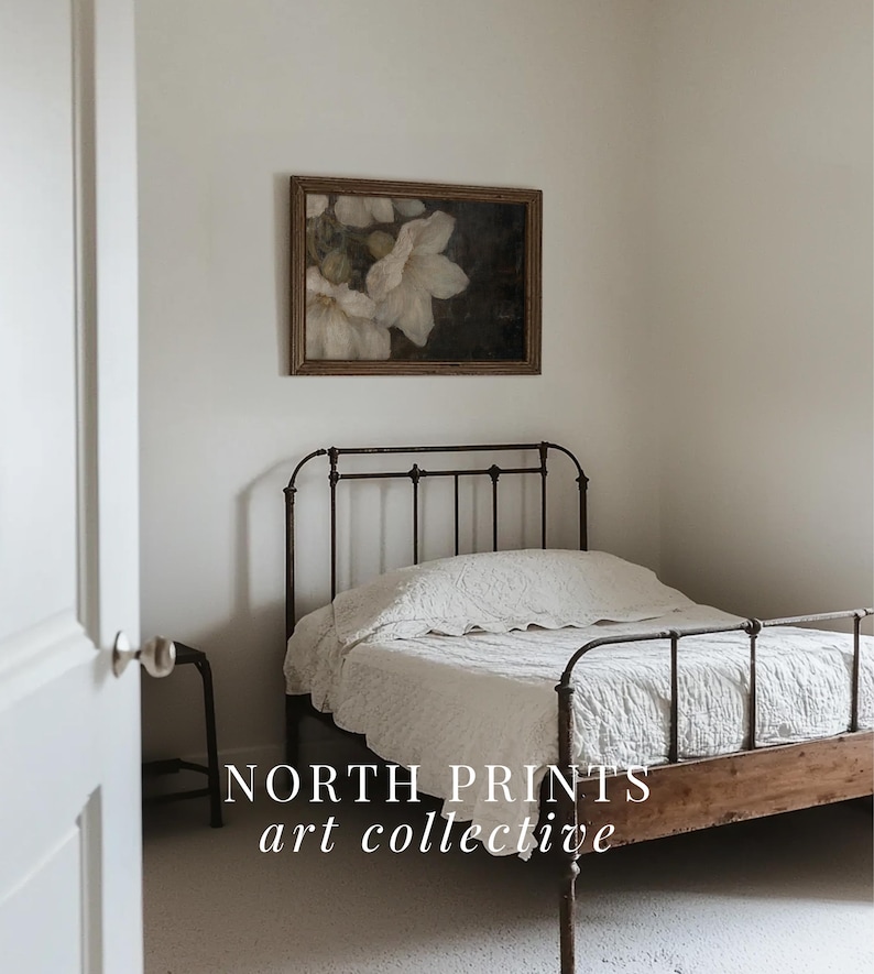 May include: A white iron bed frame with a white linen duvet and a framed floral print above the headboard. The text "NORTH PRINTS art collective" is visible in the bottom of the image.