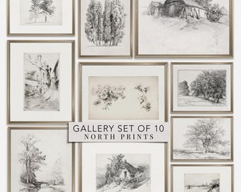 May include: A gallery set of 10 North Prints featuring black and white charcoal-style landscape sketches in metallic frames. The collection includes drawings of trees, rural cottages, and natural scenery with the text GALLERY SET OF 10 NORTH PRINTS.