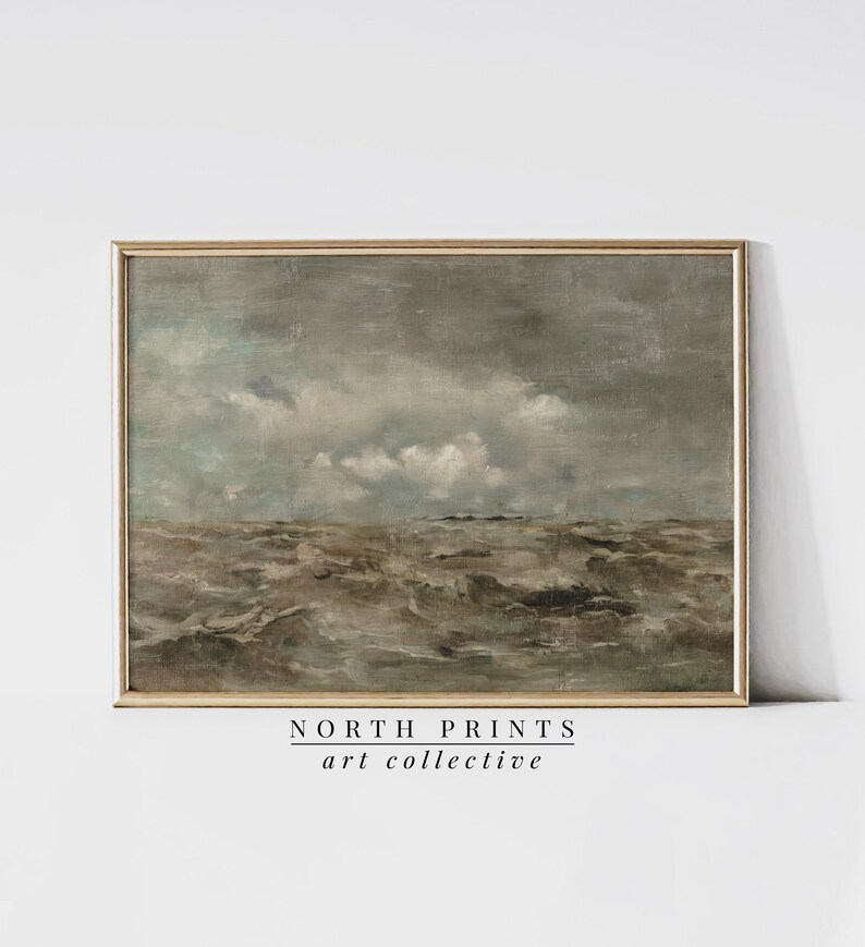 May include: A framed painting of a seascape with a stormy sky and choppy waves. The sky is a muted gray with white clouds. The waves are a dark brown and gray.