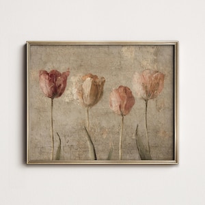 May include: A framed art print featuring four tulips in varying shades of red, orange, and pink. The flowers are set against a textured, neutral-toned background, creating a vintage aesthetic. The gold frame adds a touch of elegance to the floral artwork.