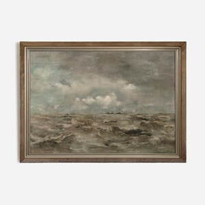 May include: A framed painting depicting a seascape with a stormy sea and a cloudy sky. The painting is done in muted tones of gray, brown, and white.