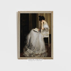 May include: A painting of a woman in a white dress sitting in a chair and reading a book. The woman is wearing a white dress with a lace trim and her hair is pulled back in a bun. The painting is set in a room with a dark background and a light-colored wall.