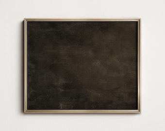 Puede incluir: Una obra de arte enmarcada con una superficie oscura y texturizada. La obra está encerrada en un marco delgado de color dorado, creando un contraste con el interior oscuro. Está montada en una pared blanca.