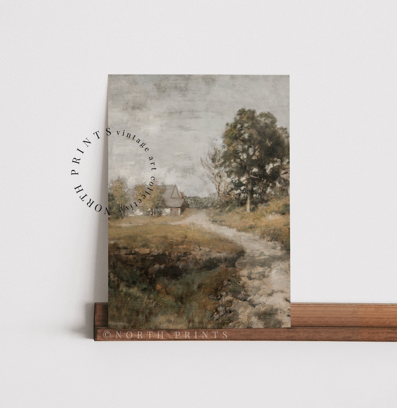 May include: A vintage art print featuring a painting of a country road leading to a small house with a tree in the foreground. The painting is done in muted tones of brown, green, and gray.
