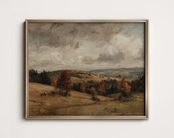 Puede incluir: Pintura de paisaje enmarcada que representa una colina ondulada bajo un cielo nublado. La obra de arte presenta colores otoñales, con tonos marrones, verdes y rojos en los árboles y los campos. El marco es dorado.