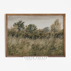 Puede incluir: Una pintura enmarcada de un paisaje con un campo de hierba alta y &aacute;rboles en el fondo. La pintura est&aacute; en un marco de madera y tiene una paleta de colores apagados.