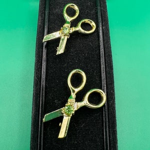 Vintage Pair of Scissors brooch with green rhinestone