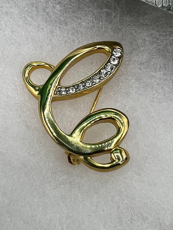 Louis Vuitton Gold Tone Initials Brooch