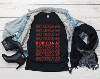 May include: Black t-shirt with the phrase "BORICUA AF" repeated in red text.