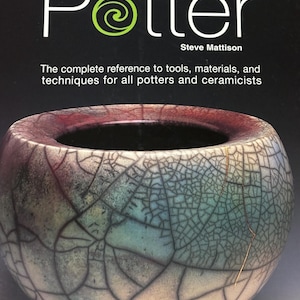 May include: A book titled The Complete Potter by Steve Mattison, featuring a subtitle about tools, materials, and techniques. The cover displays a round, raku-fired ceramic bowl with a crackled glaze in shades of blue, purple, and white.