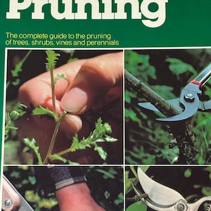May include: A book titled All About Pruning: The complete guide to the pruning of trees, shrubs, vines and perennials. The cover features four photographs showing gardening techniques, including manual plant pinching and the use of pruning shears.