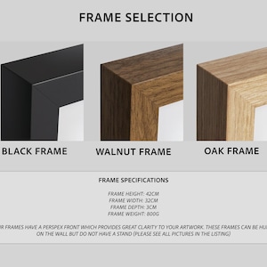 May include: Image showcasing three frame options: black, walnut, and oak. The text "Frame Selection" is at the top. Frame specifications include a height of 42cm, width of 32cm, depth of 3cm, and a weight of 800g. The frames have a perspex front.