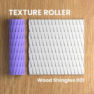 May include: A purple texture roller with a pattern of overlapping triangles. The roller is used to create a wood shingle texture on a surface. The image also shows a sample of the texture created by the roller, which is a white surface with a wood shingle pattern. The text "Wood Shingles 001" is below the sample.