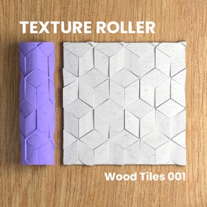 May include: A purple texture roller with a geometric pattern. The roller is next to a sample of the pattern, which is a white wood tile with a geometric design. The text "Wood Tiles 001" is below the sample.