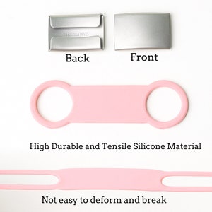 Puede incluir: Correa de silicona rosa con dos bucles, dise&ntilde;ada para ser duradera y resistente a la deformaci&oacute;n. La correa se muestra estirada, demostrando su flexibilidad. El texto "High Durable and Tensile Silicone Material" y "Not easy to deform and break" es visible debajo de la correa.