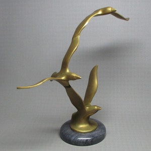 Brass sculpture of three flying seagulls on marble base , similar to Jere .