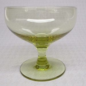 Russel Wright American Modern glass in chartreuse liquor / cocktail (1990B)