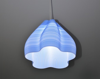 May include: A blue and white patterned pendant light fixture with a white ceiling mount.