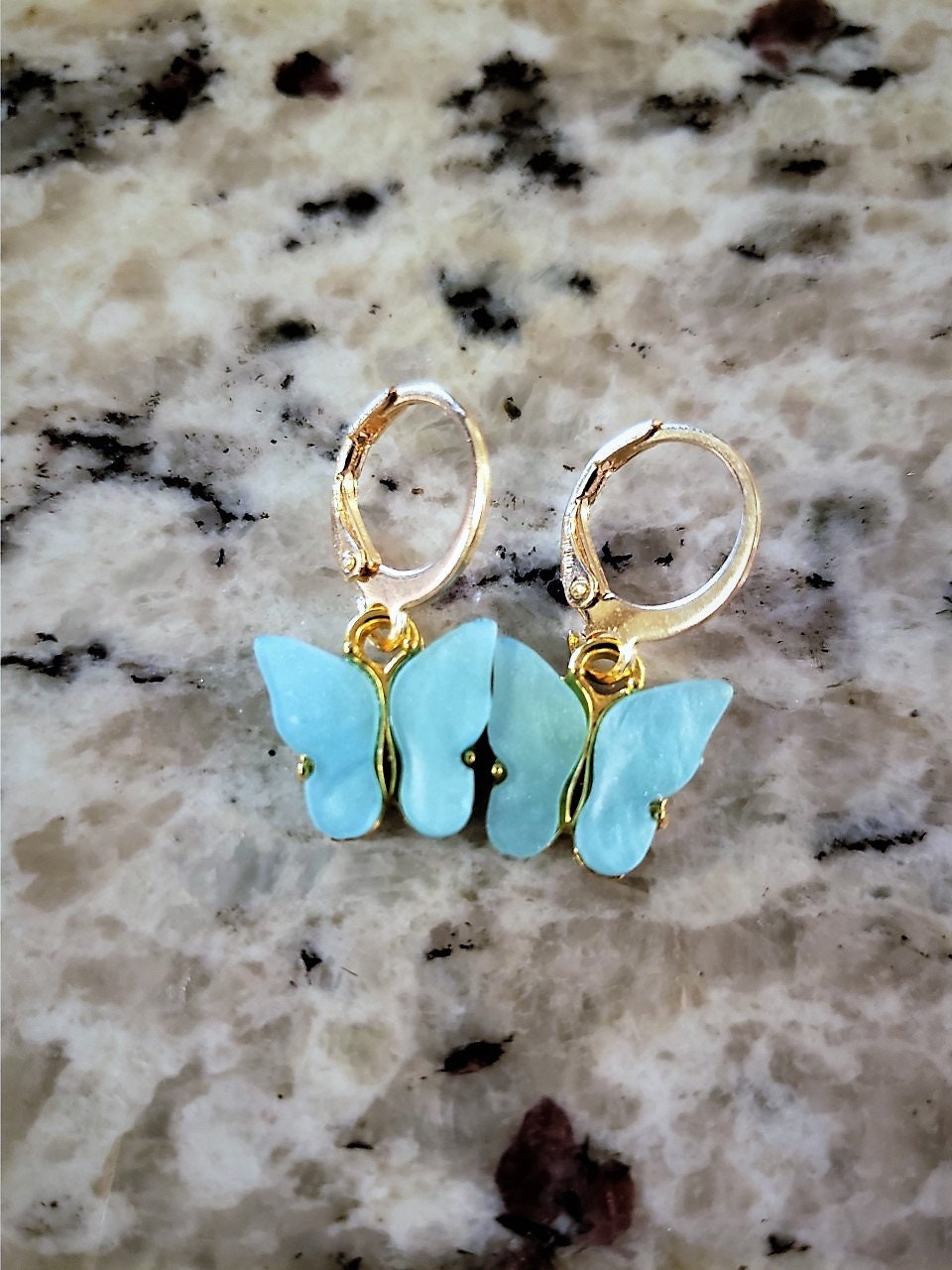 Blue tigers eye, blue butterfly charms, gold metal earrings. – Andria  Bieber Designs