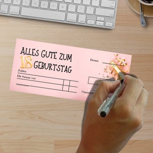 May include: Pink and white gift certificate with gold lettering that says "Alles Gute zum 18 Geburtstag". The certificate has a space for the date, amount, and signature.