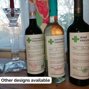 May include: Three wine bottles with labels that look like prescriptions. The labels have a green cross and say "Christmas Special Prescription", "Birthday Wine Prescription", and "Wine Prescription".