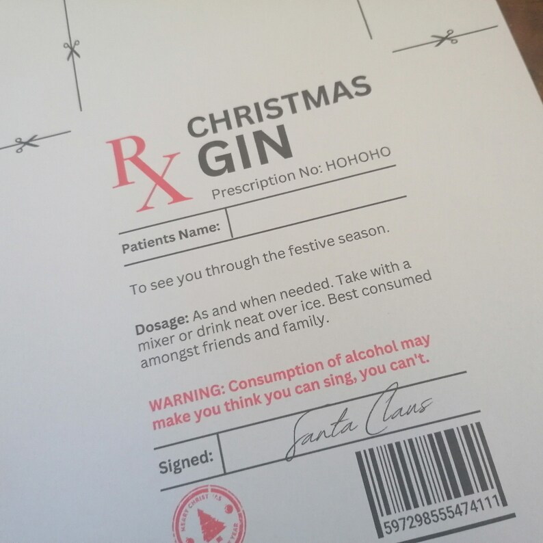 May include: A humorous Christmas-themed prescription for "Christmas Gin" with the prescription number "HOHOHO". The dosage instructions are to take the gin as needed with a mixer or neat over ice. The warning states that consumption of alcohol may make you think you can sing, but you can't. The prescription is signed by "Santa Claus" and includes a barcode.