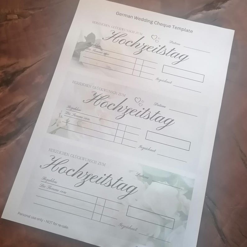 May include: Three German wedding cheque templates printed on white paper. The templates feature the word "Hochzeitstag" in elegant script, along with spaces for details. Floral accents and the text "Personal use only - NOT for re-sale" are also visible.