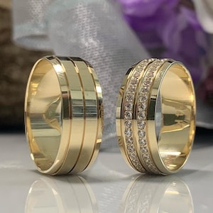 Image of 14k Gold Wedding Bands Set

A close-up of a stunning 14k gold wedding bands set, crafted with exquisite detail and featuring a unique design that symbolizes the everlasting love and connection between two souls.