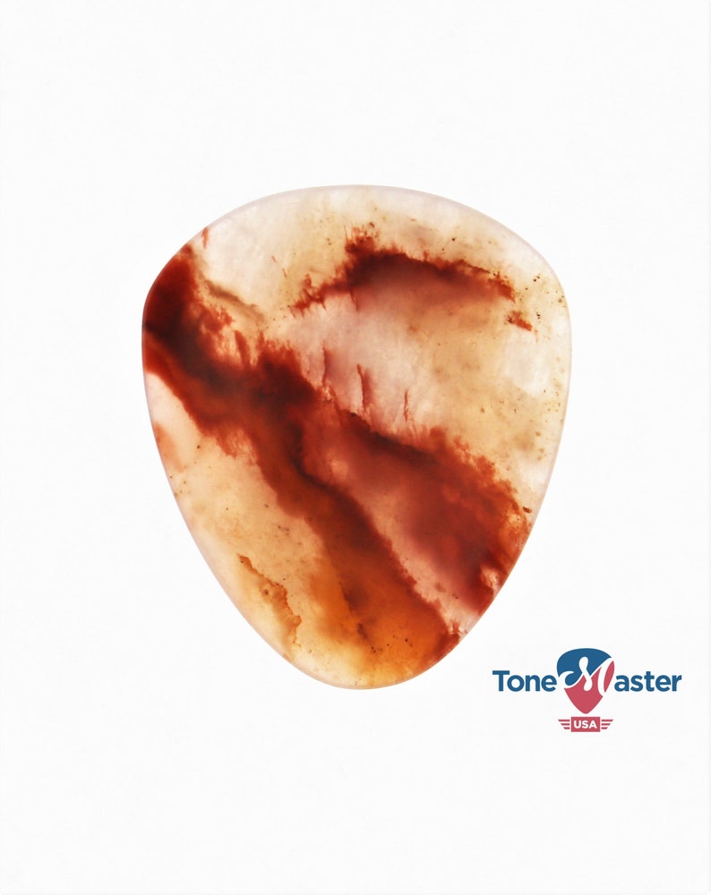 Tone-Master MN018B Brazil Crazy Stone Tone-Master guitar pick. Tone-Master MN018B Brazil Crazy Stone Tone-Master guitar pick.