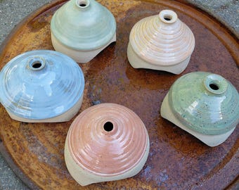 Large, hardy toad house. Made of speckled clay.