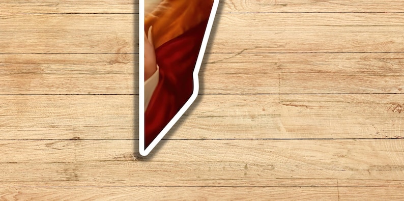 May include: A close-up of a painting of a person wearing a red and gold robe. The painting is framed in a white border.