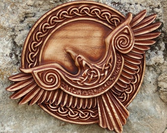 A raven  wooden panel Norse viking mythology Odin