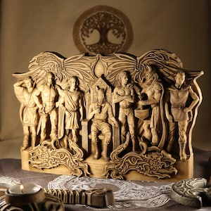 May include: A wooden carving of eight Norse gods and goddesses, including Odin, Thor, and Freya. The figures are carved in a realistic style and are arranged in a circle around a central tree. The carving is painted in shades of brown and gold.